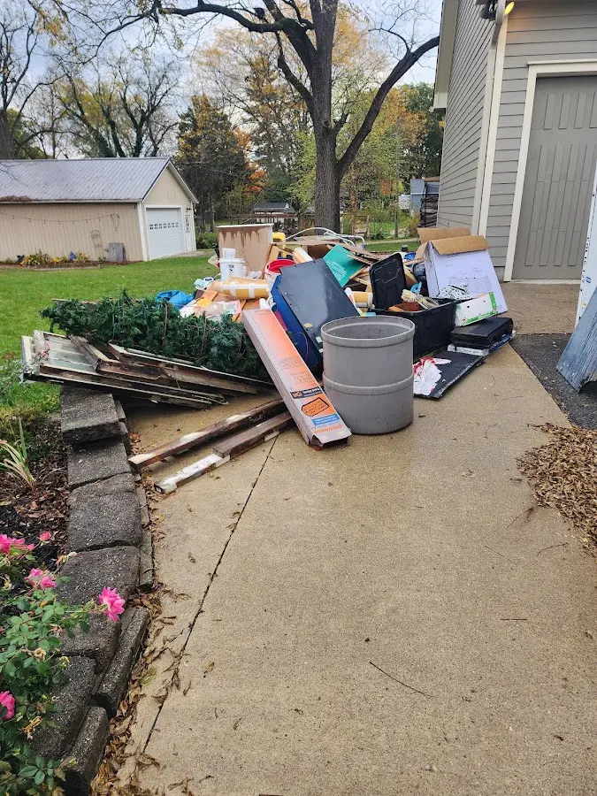 Dumpster being loaded with debris for Residential Dumpster Rental in Wichita Falls